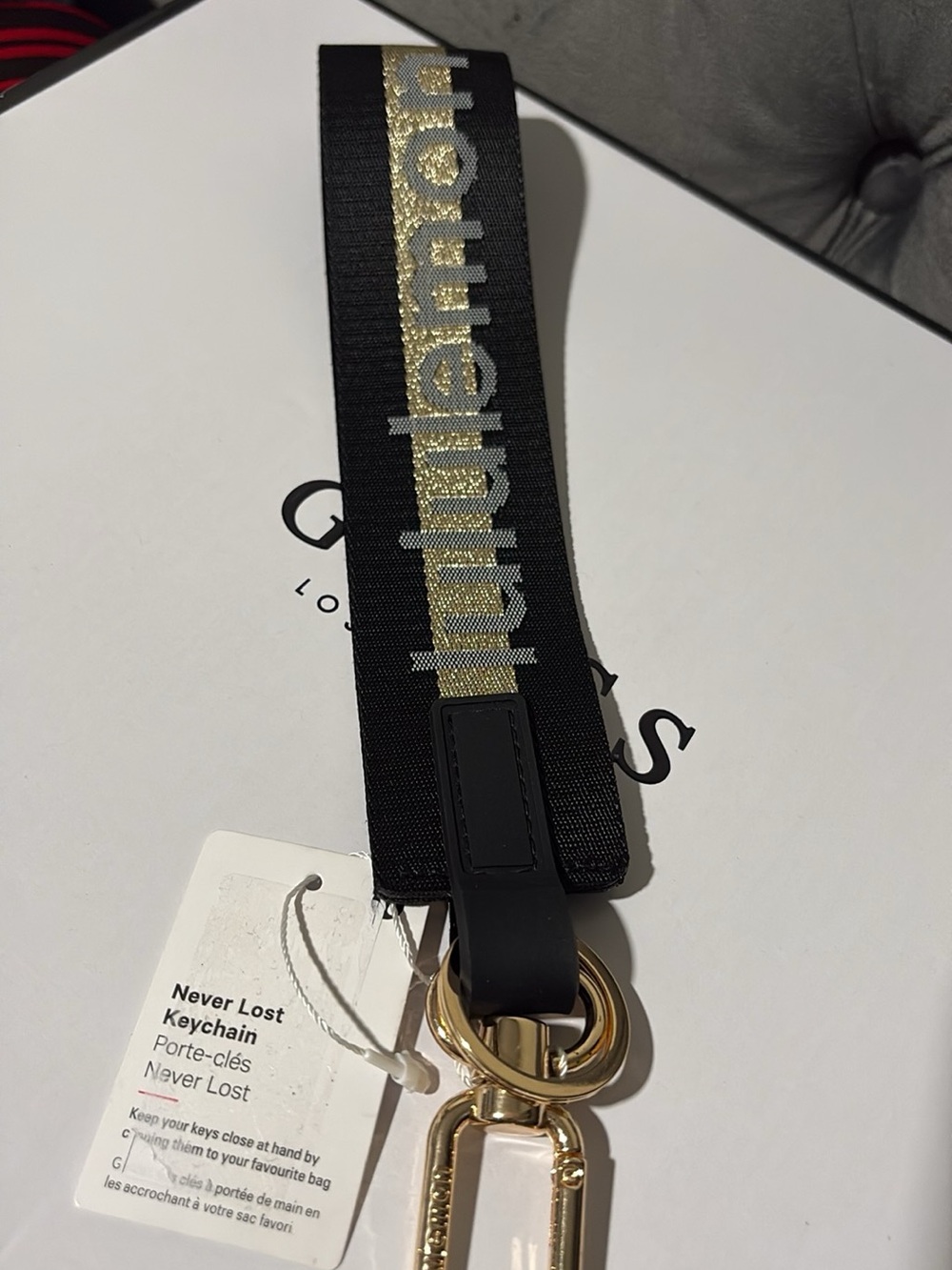 lululemon athletica Black and Gold Key Ring Wristlet